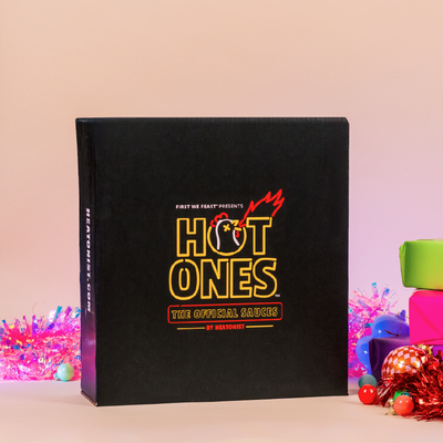Gift box with 'Hot Ones' branding on a colorful background