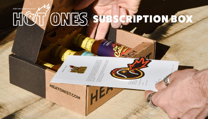 A Hot Ones Subscription Box with descriptive letter and sticker